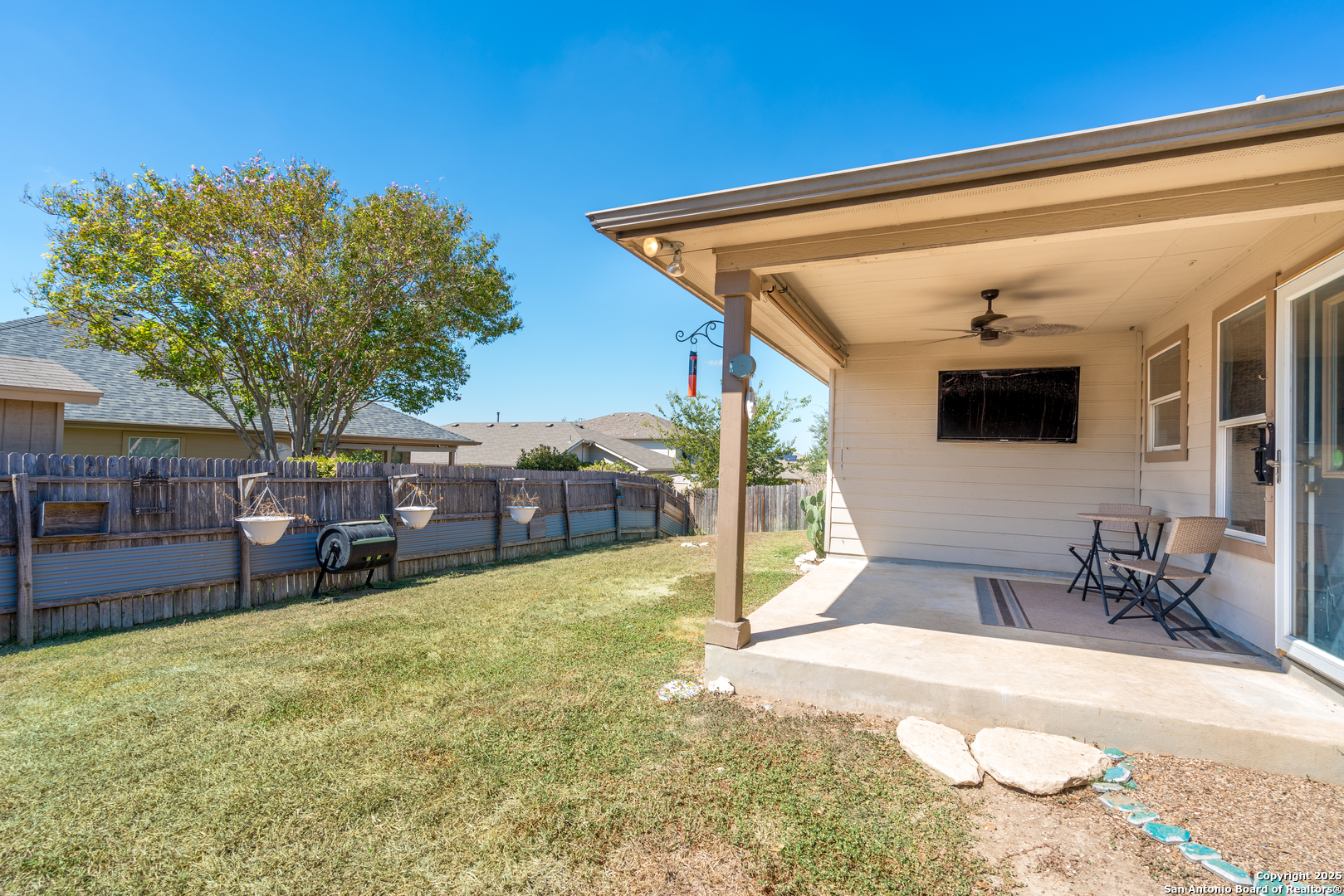 720 Fountain Gate Schertz, TX 78108 - Photo 30 of 34 a view of a house with backyard and sitting area
