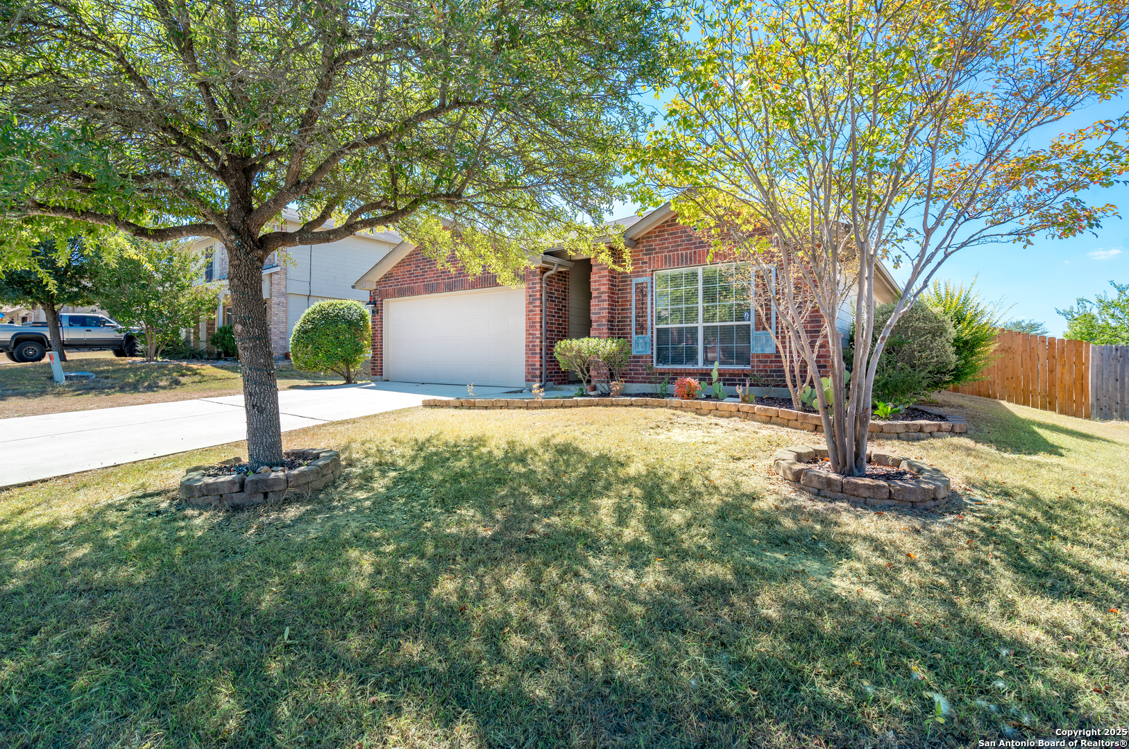 720 Fountain Gate Schertz, TX 78108 - Photo 4 of 34 a front view of a house with garden