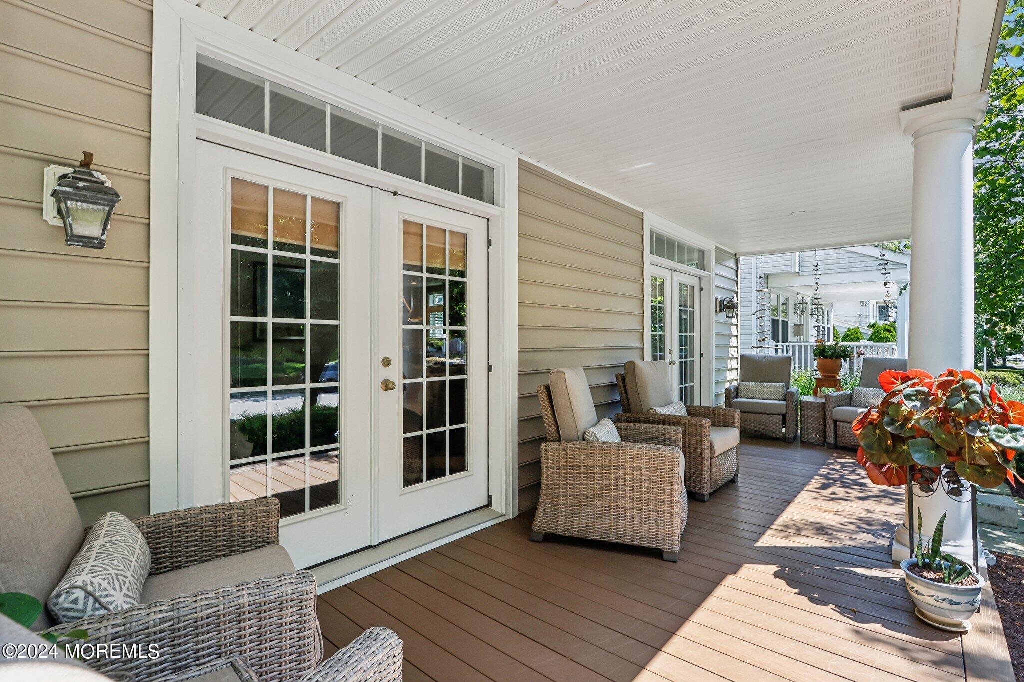 317 Worthington Avenue Spring Lake, NJ 07762 - Photo 12 of 85 a view of a patio with couches and potted plants