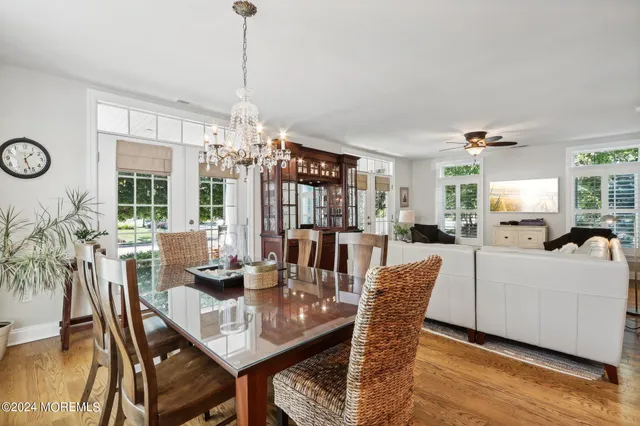 a kitchen with stainless steel appliances granite countertop a stove and a refrigerator