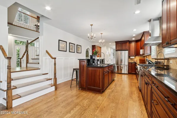 a utility room with sink dryer and washer