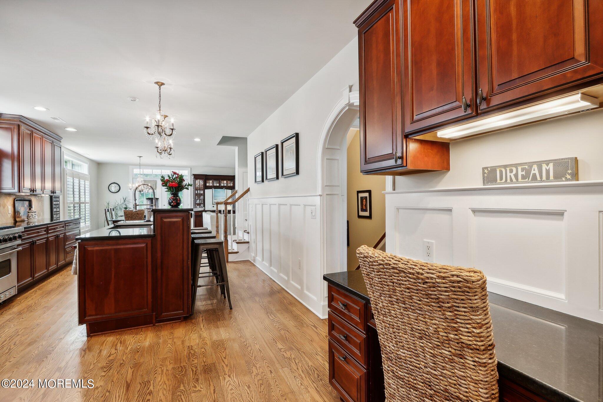 317 Worthington Avenue Spring Lake, NJ 07762 - Photo 29 of 85 a living room with furniture and a kitchen