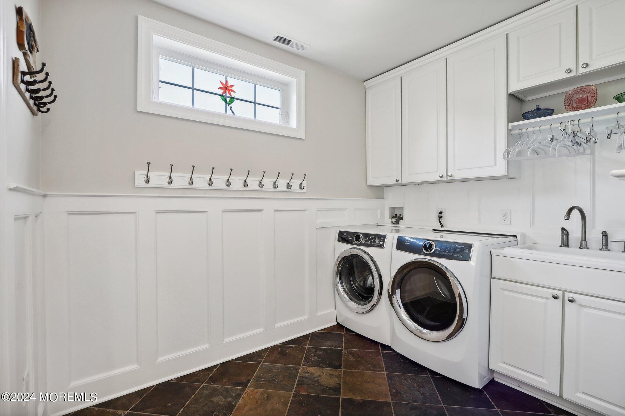 317 Worthington Avenue Spring Lake, NJ 07762 - Photo 33 of 85 a utility room with sink dryer and washer