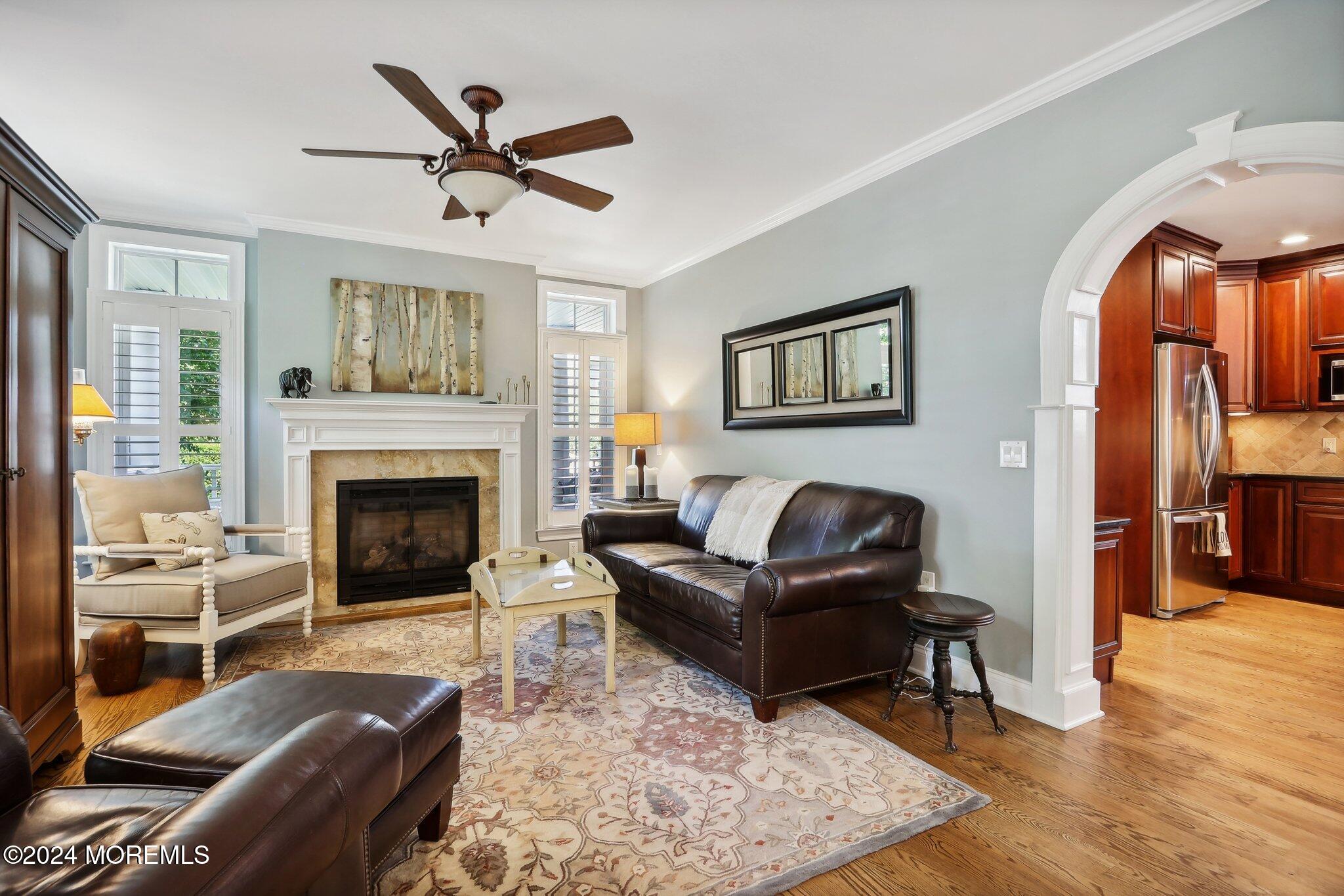317 Worthington Avenue Spring Lake, NJ 07762 - Photo 5 of 85 a living room with furniture and a fireplace
