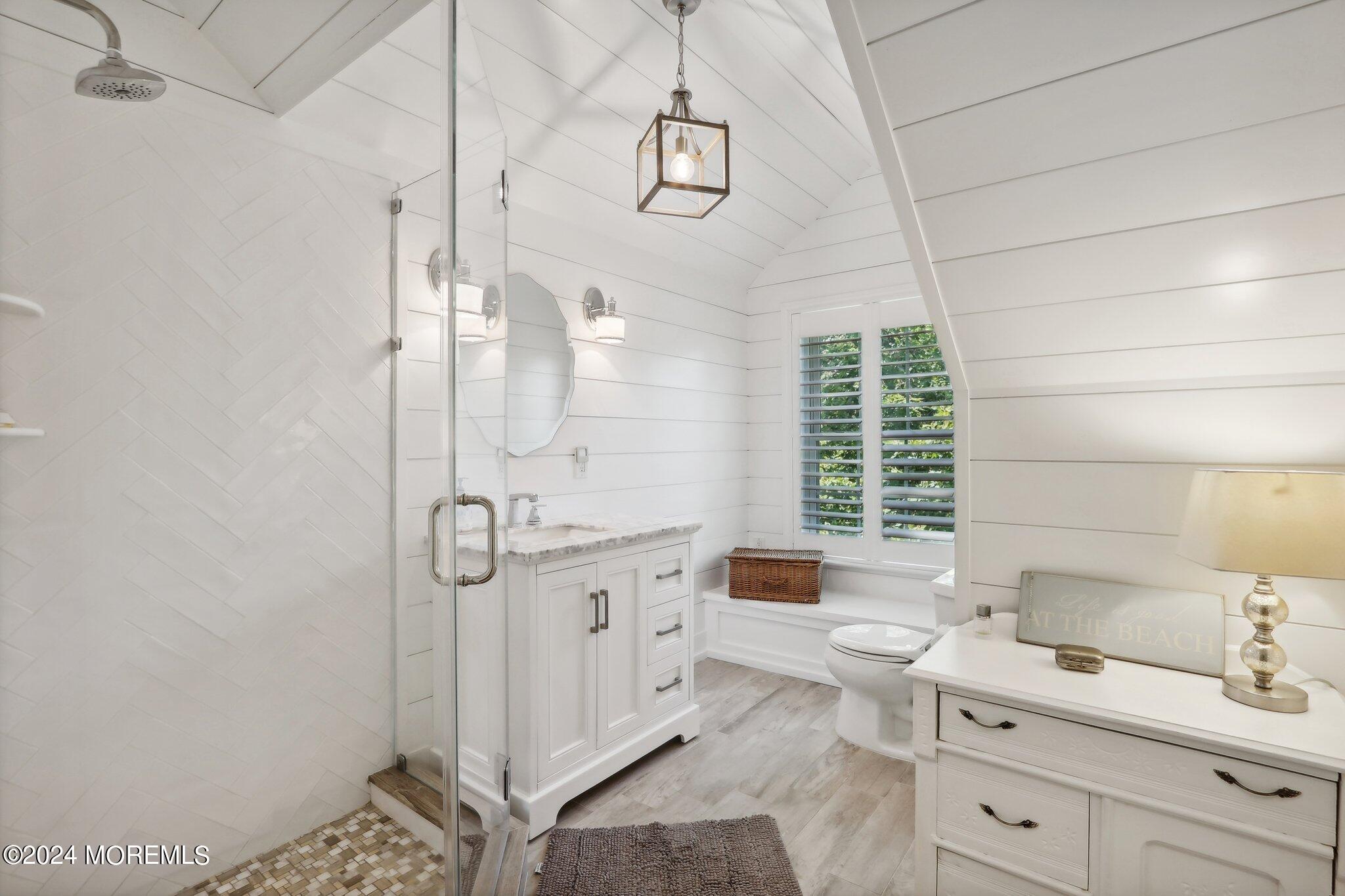 317 Worthington Avenue Spring Lake, NJ 07762 - Photo 55 of 85 a bathroom with a granite countertop sink a toilet and shower