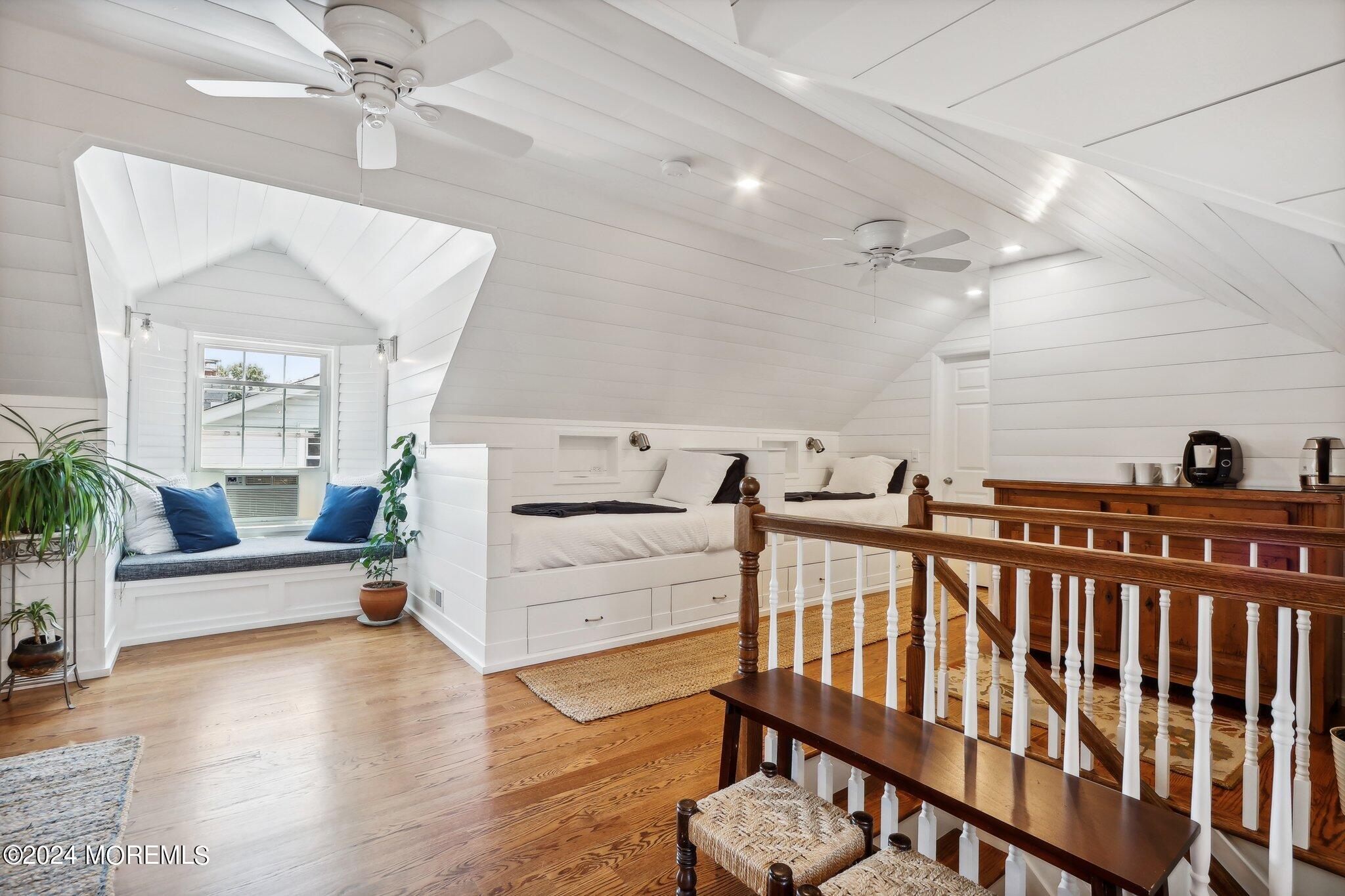 317 Worthington Avenue Spring Lake, NJ 07762 - Photo 58 of 85 a view of a livingroom with furniture staircase and a ceiling fan