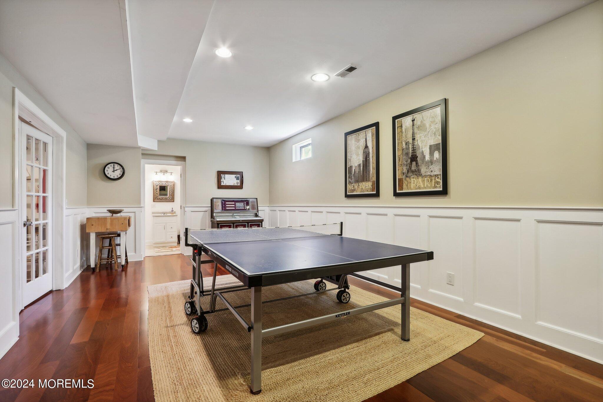 317 Worthington Avenue Spring Lake, NJ 07762 - Photo 65 of 85 a view of a room with furniture and wooden floor