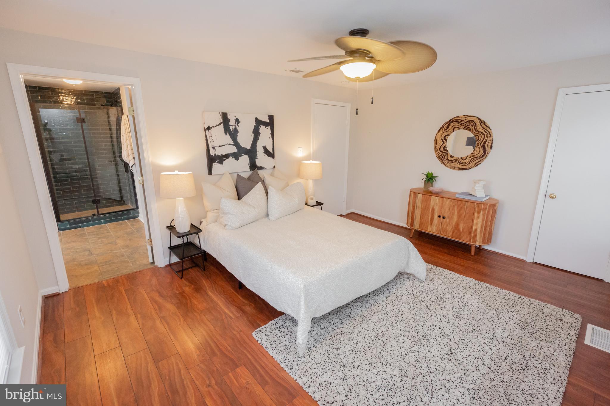 2129 Channing Street Northeast Washington, DC 20018 - Photo 20 of 37 a bedroom with a bed and a chandelier