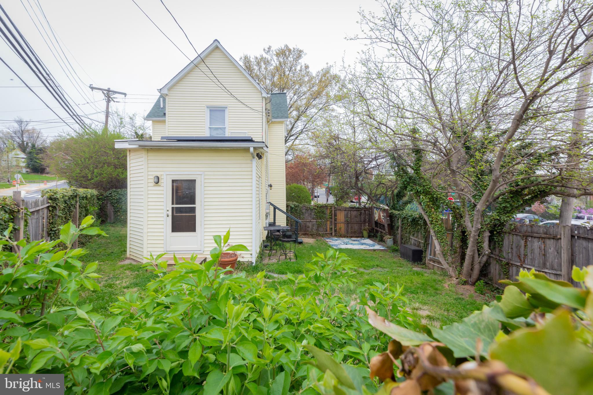 2129 Channing Street Northeast Washington, DC 20018 - Photo 29 of 37 a front view of a house with garden
