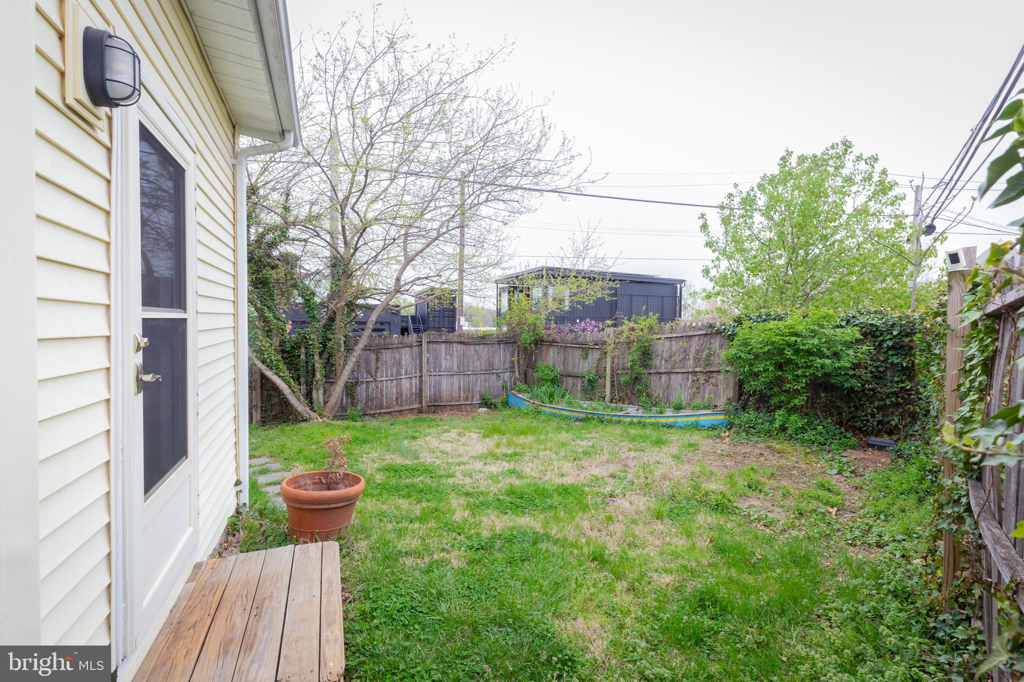 2129 Channing Street Northeast Washington, DC 20018 - Photo 30 of 37 a backyard of a house with lots of green space