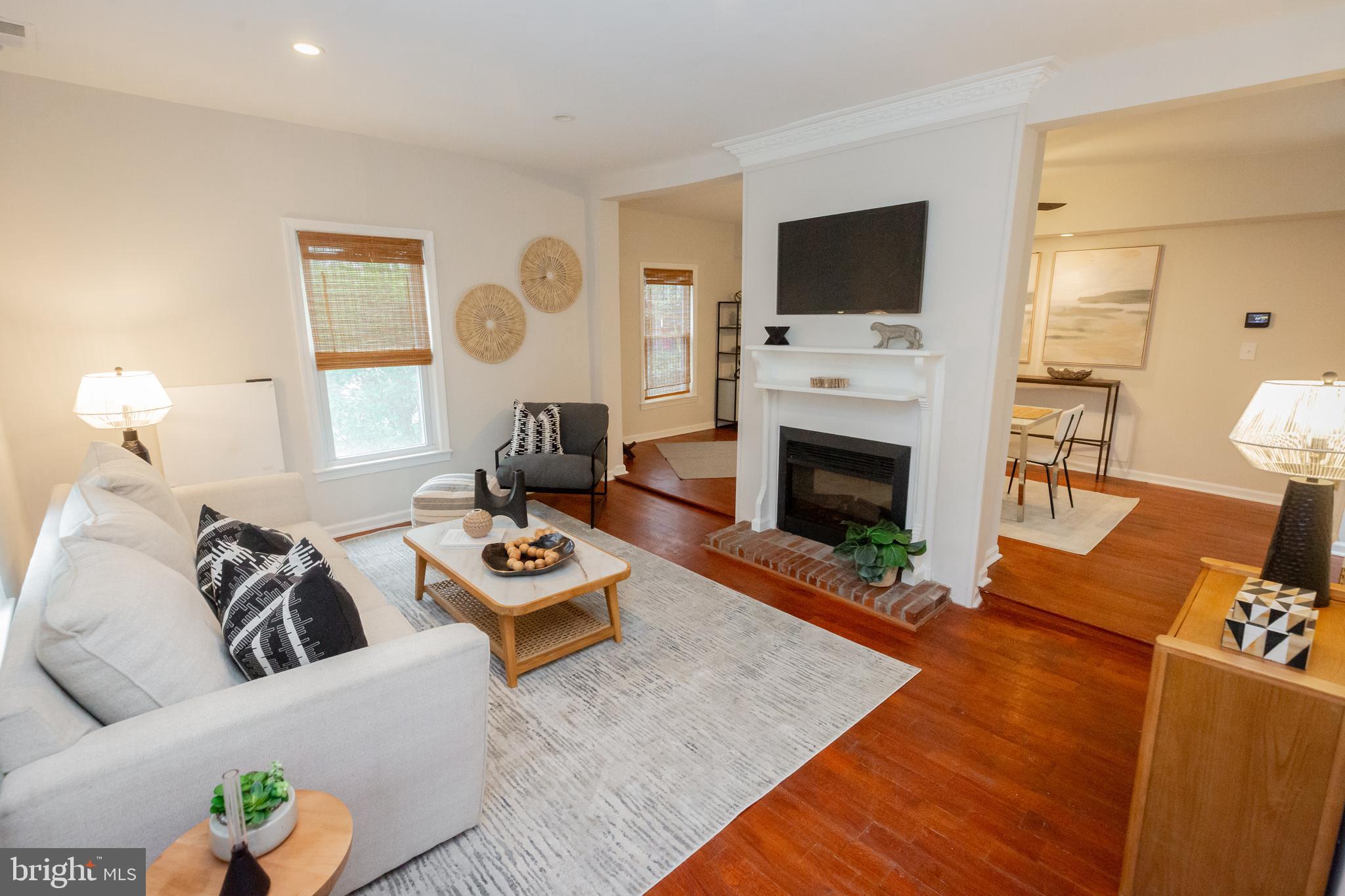 2129 Channing Street Northeast Washington, DC 20018 - Photo 3 of 37 a living room with furniture and a fireplace