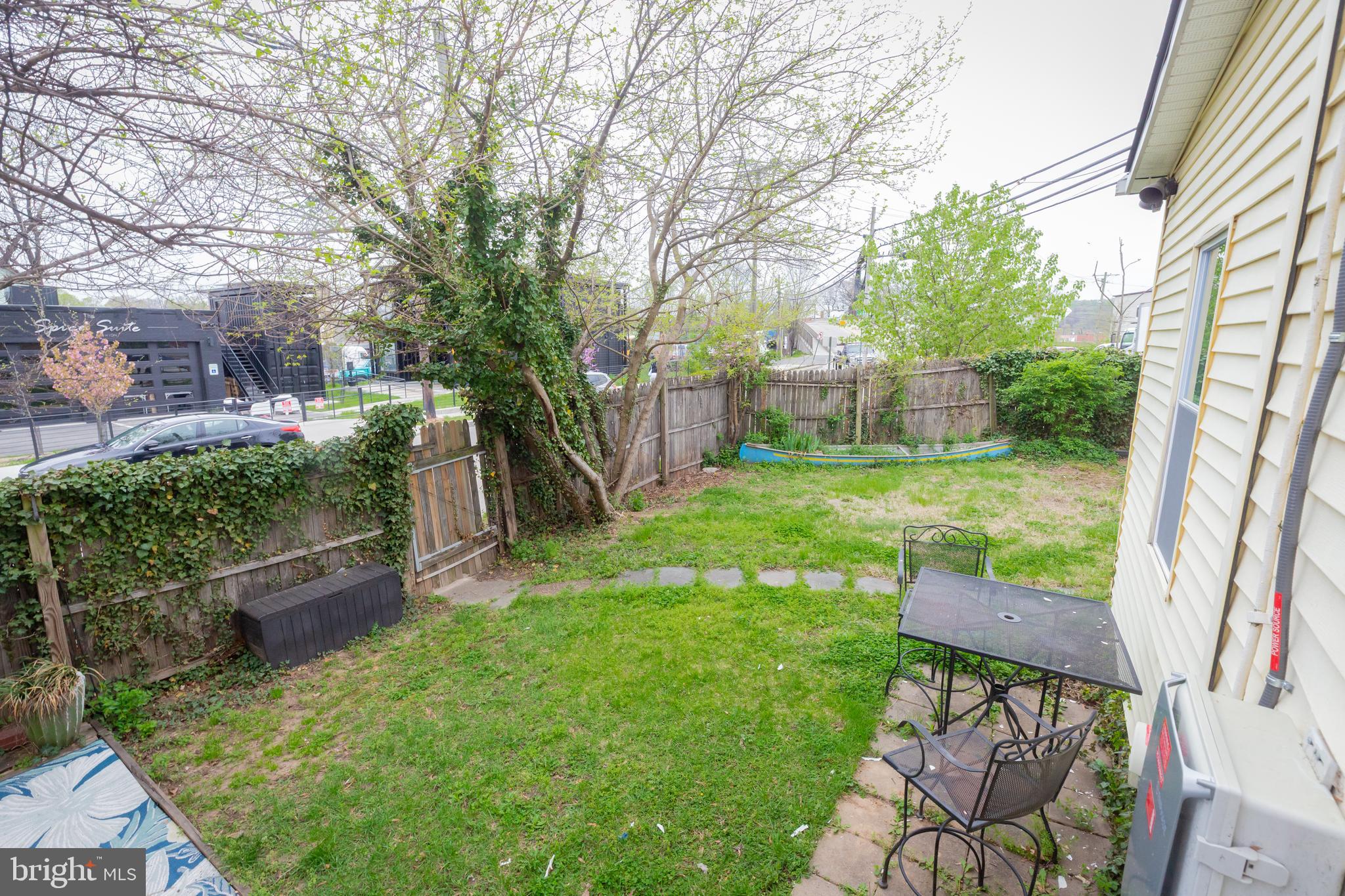 2129 Channing Street Northeast Washington, DC 20018 - Photo 32 of 37 a backyard of a house with seating space