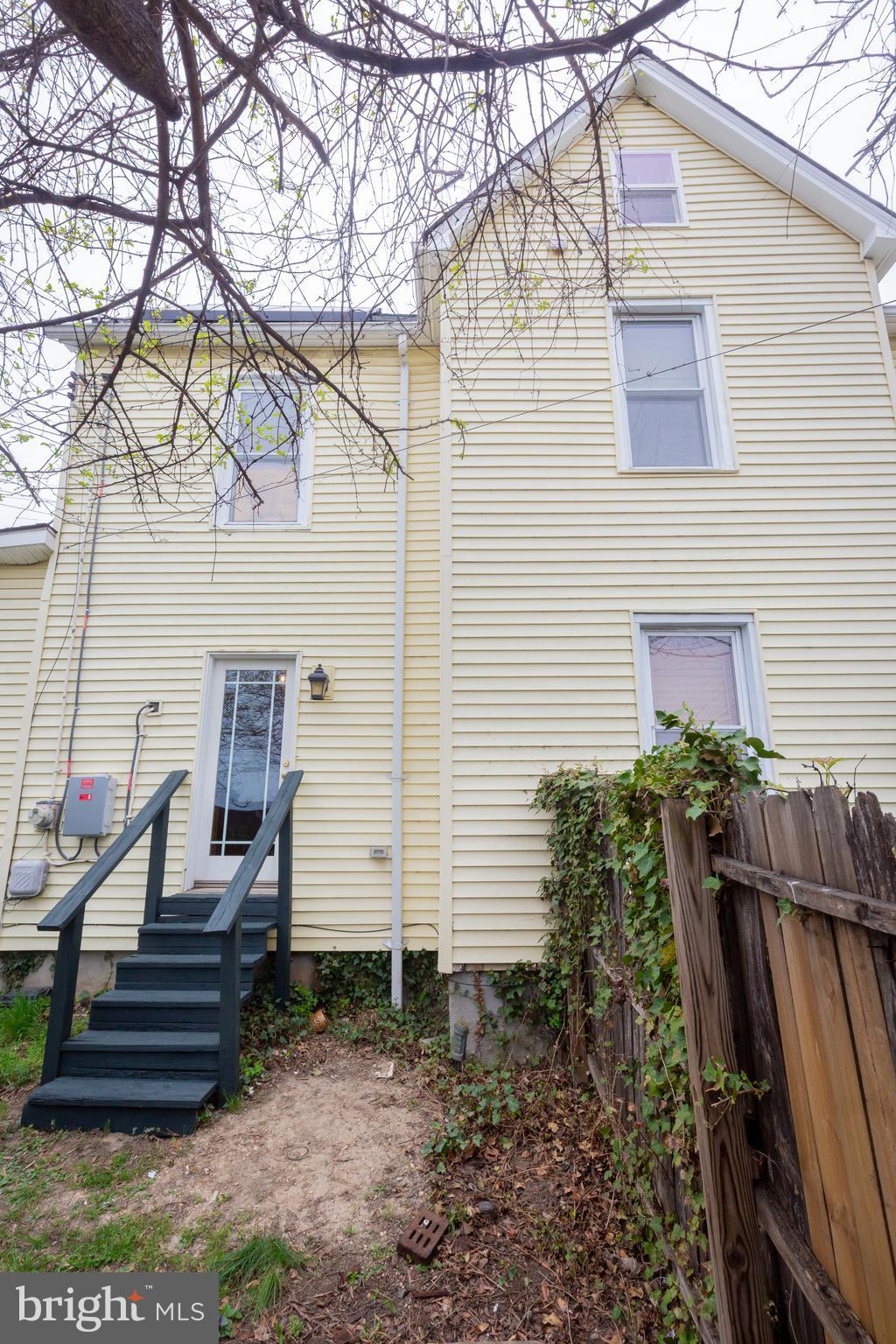2129 Channing Street Northeast Washington, DC 20018 - Photo 33 of 37 a view of a house with backyard and trees