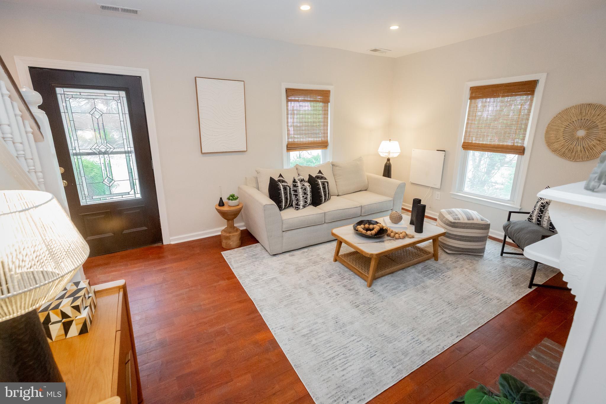 2129 Channing Street Northeast Washington, DC 20018 - Photo 4 of 37 a living room with furniture rug and window