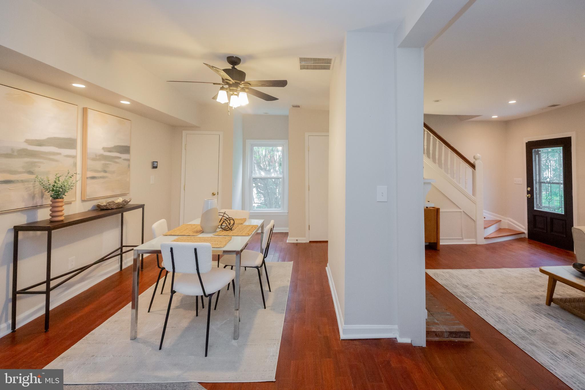 2129 Channing Street Northeast Washington, DC 20018 - Photo 9 of 37 a view of a dining room with furniture window and wooden floor