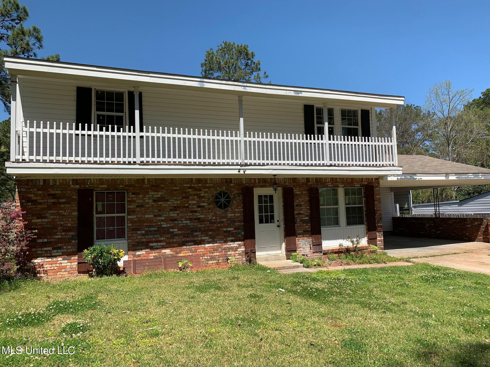 1005 Post Road Clinton, MS 39056 - Photo 1 of 23 Front of House