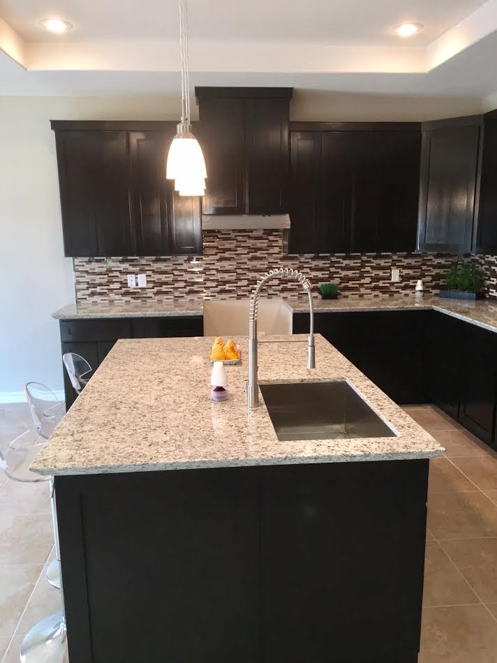 6303 Ramin Court Laredo, TX 78041 - Photo 11 of 20 a kitchen with a sink and a stove