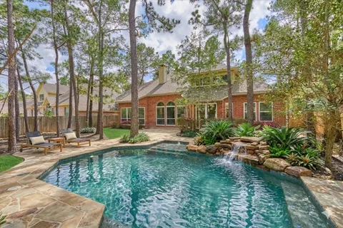 $795,000 | 18 Gallant Oak Place, The Woodlands, TX 77381