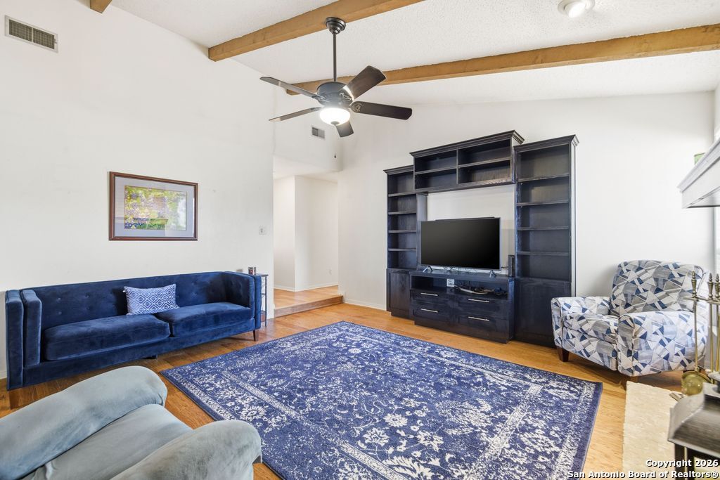 1909 Killarney Drive Leander, TX 78641 - Photo 8 of 29 a living room with furniture and a flat screen tv