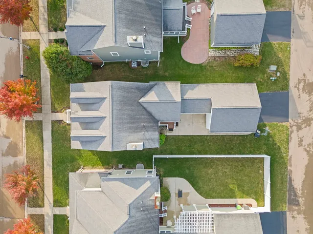 an aerial view of a house with a garden