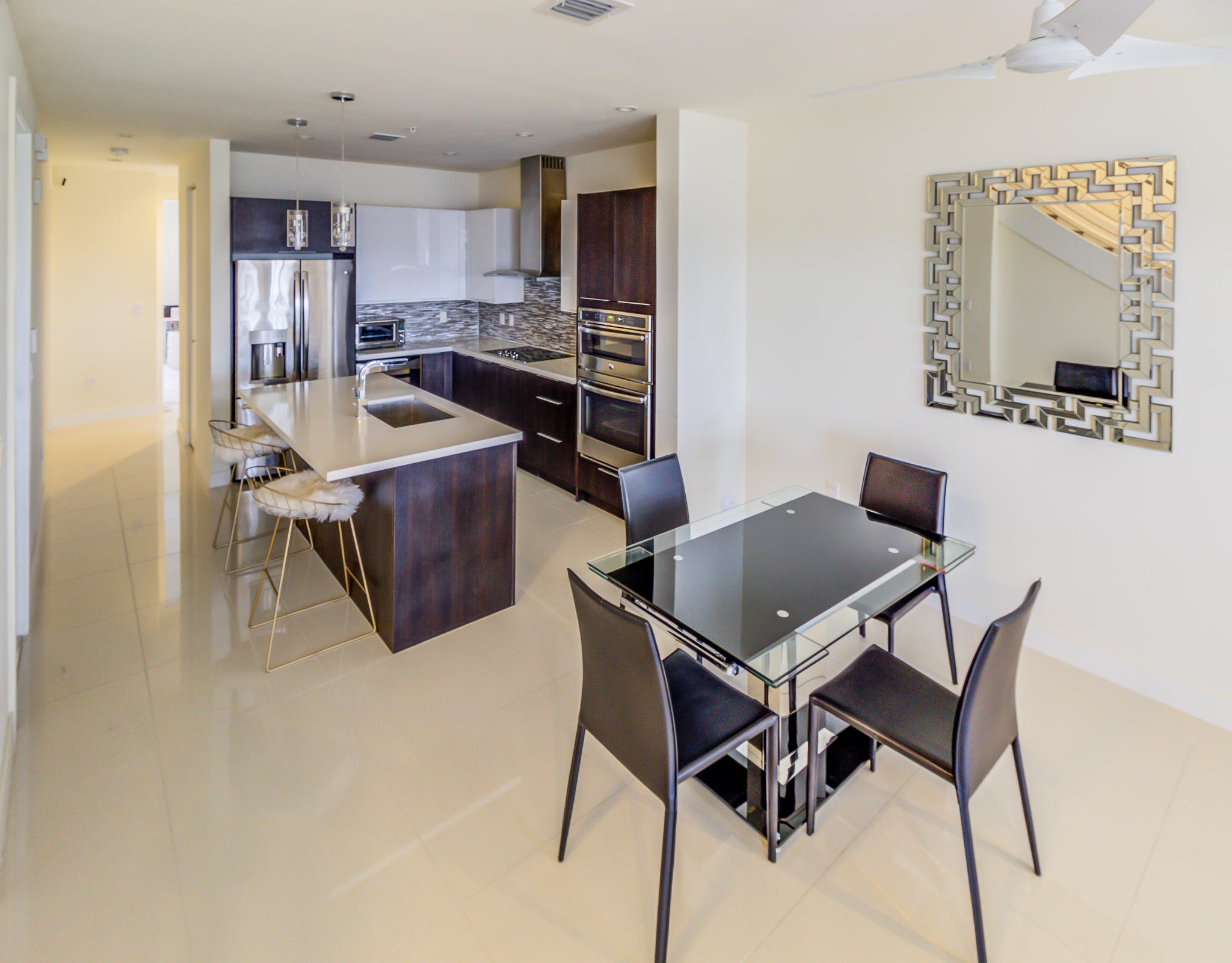6415 Northwest 102nd Path, Unit 201 Doral, FL 33178 - Photo 15 of 41 a view of a dining room with furniture