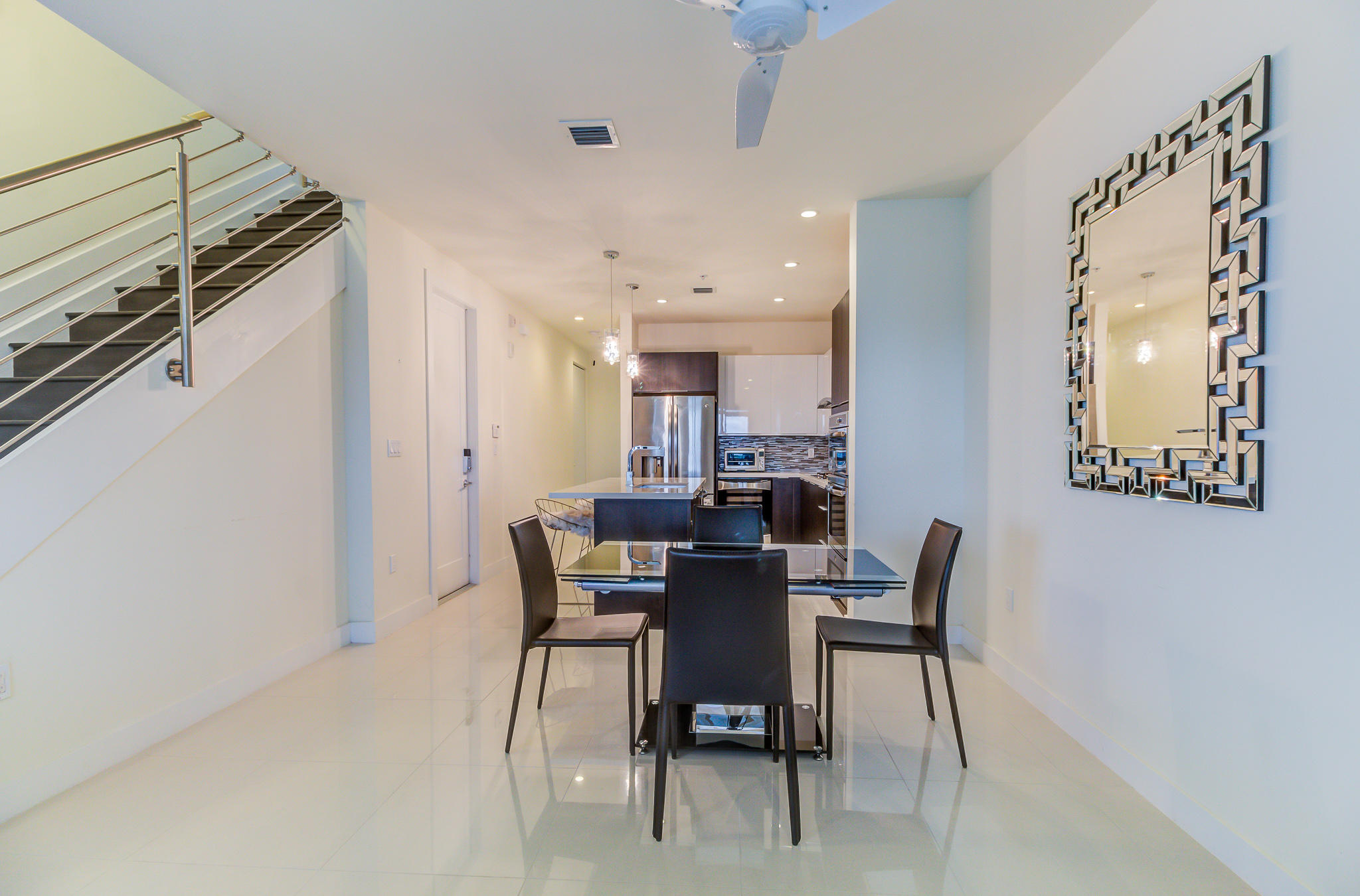 6415 Northwest 102nd Path, Unit 201 Doral, FL 33178 - Photo 16 of 41 a view of a dining room with furniture