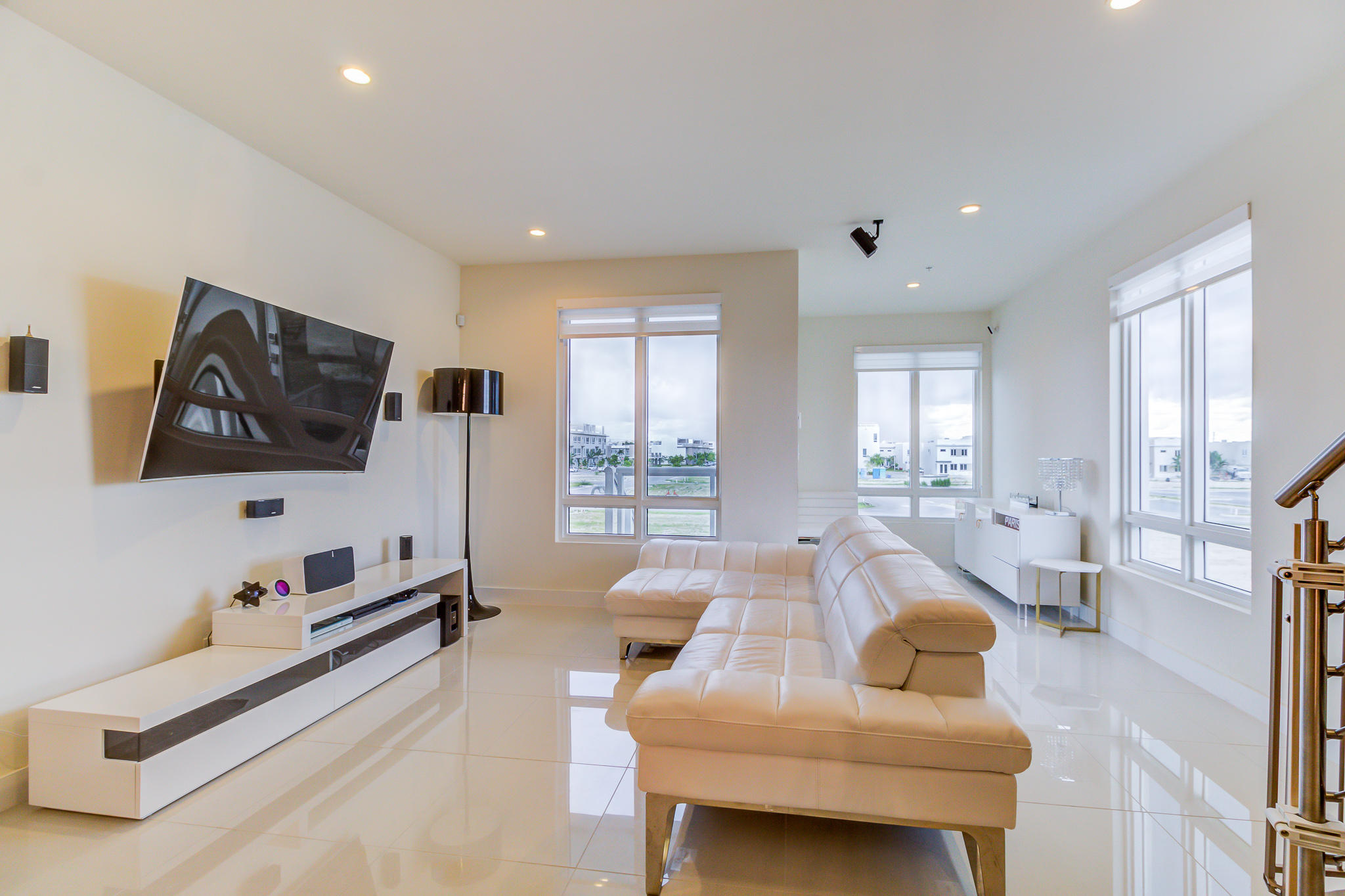 6415 Northwest 102nd Path, Unit 201 Doral, FL 33178 - Photo 19 of 41 a living room with furniture and a flat screen tv
