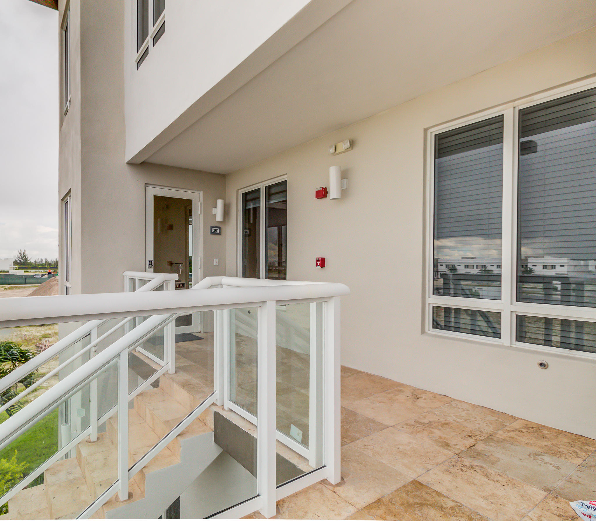 6415 Northwest 102nd Path, Unit 201 Doral, FL 33178 - Photo 21 of 41 a view of a large white kitchen