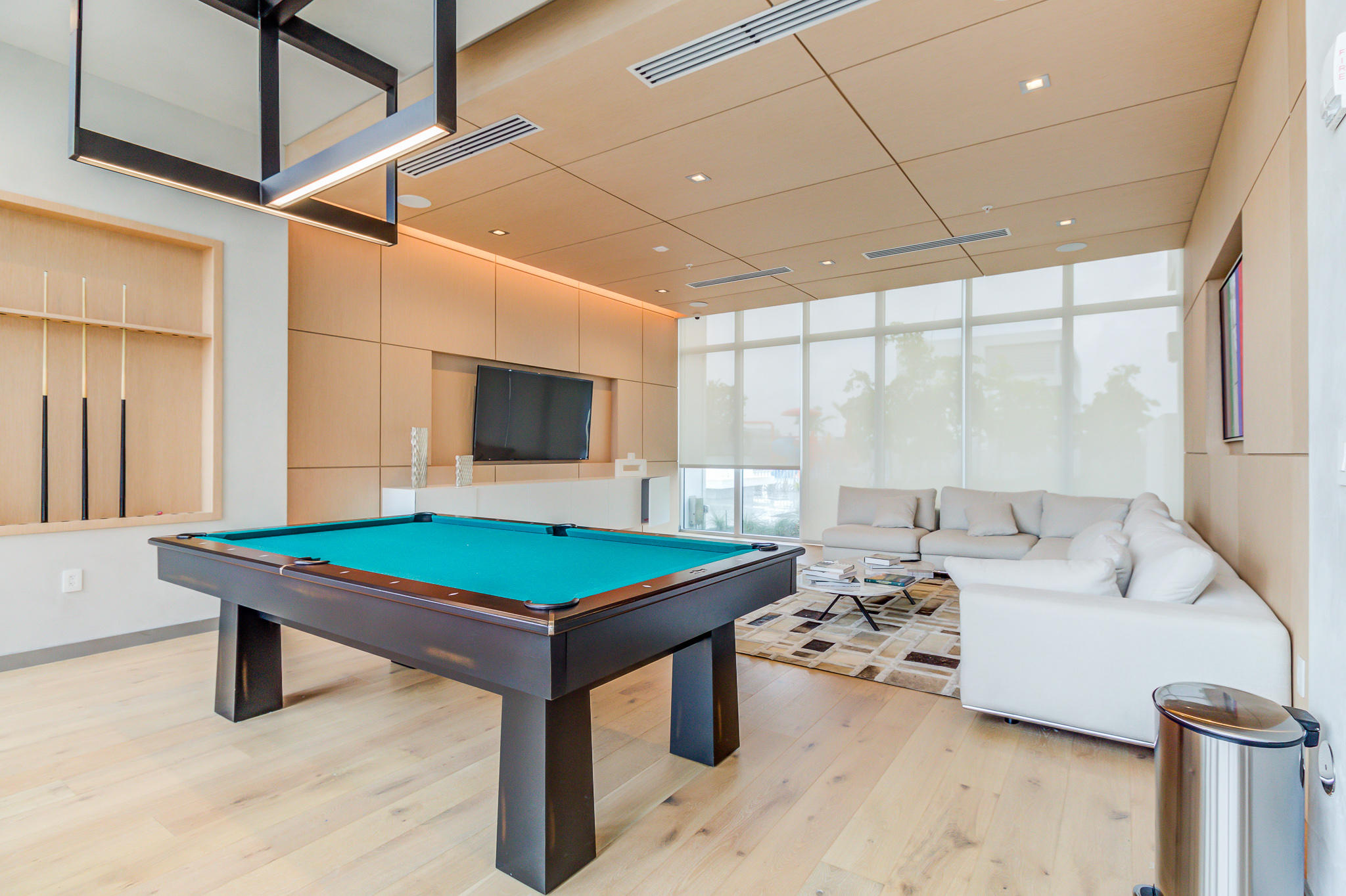 6415 Northwest 102nd Path, Unit 201 Doral, FL 33178 - Photo 25 of 41 a room with furniture pool table and flat screen tv