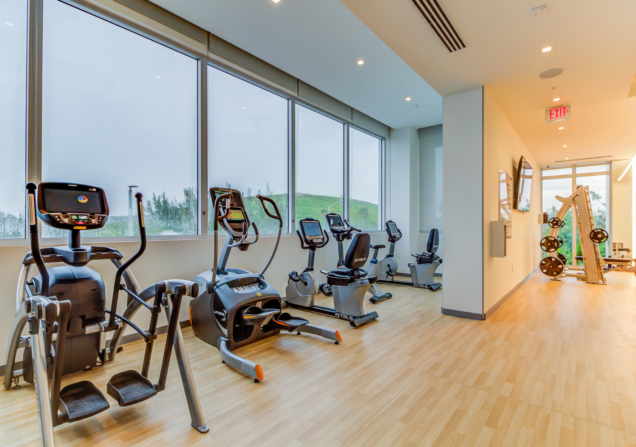 6415 Northwest 102nd Path, Unit 201 Doral, FL 33178 - Photo 27 of 41 a view of a room with gym equipment