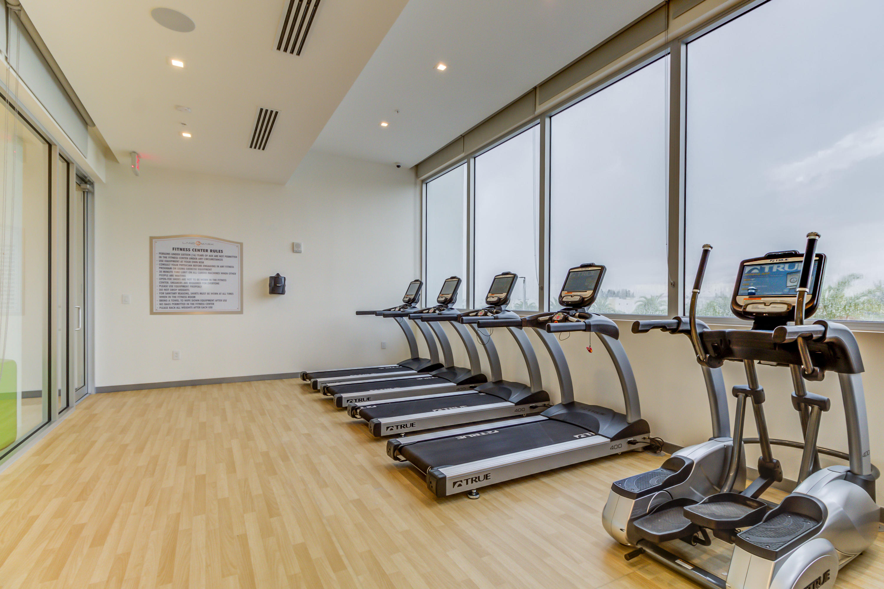 6415 Northwest 102nd Path, Unit 201 Doral, FL 33178 - Photo 28 of 41 a view of a room with gym equipment