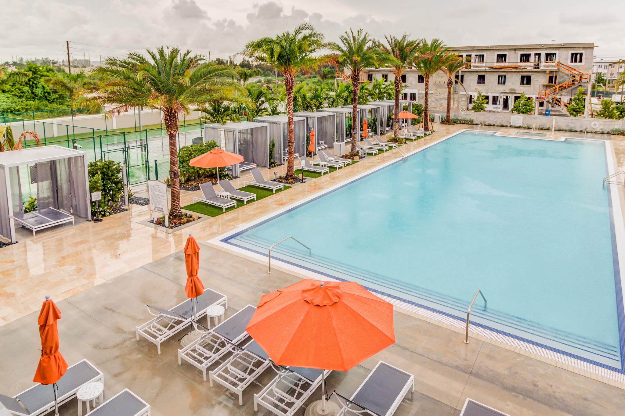 6415 Northwest 102nd Path, Unit 201 Doral, FL 33178 - Photo 33 of 41 a view of swimming pool with a lounge chair