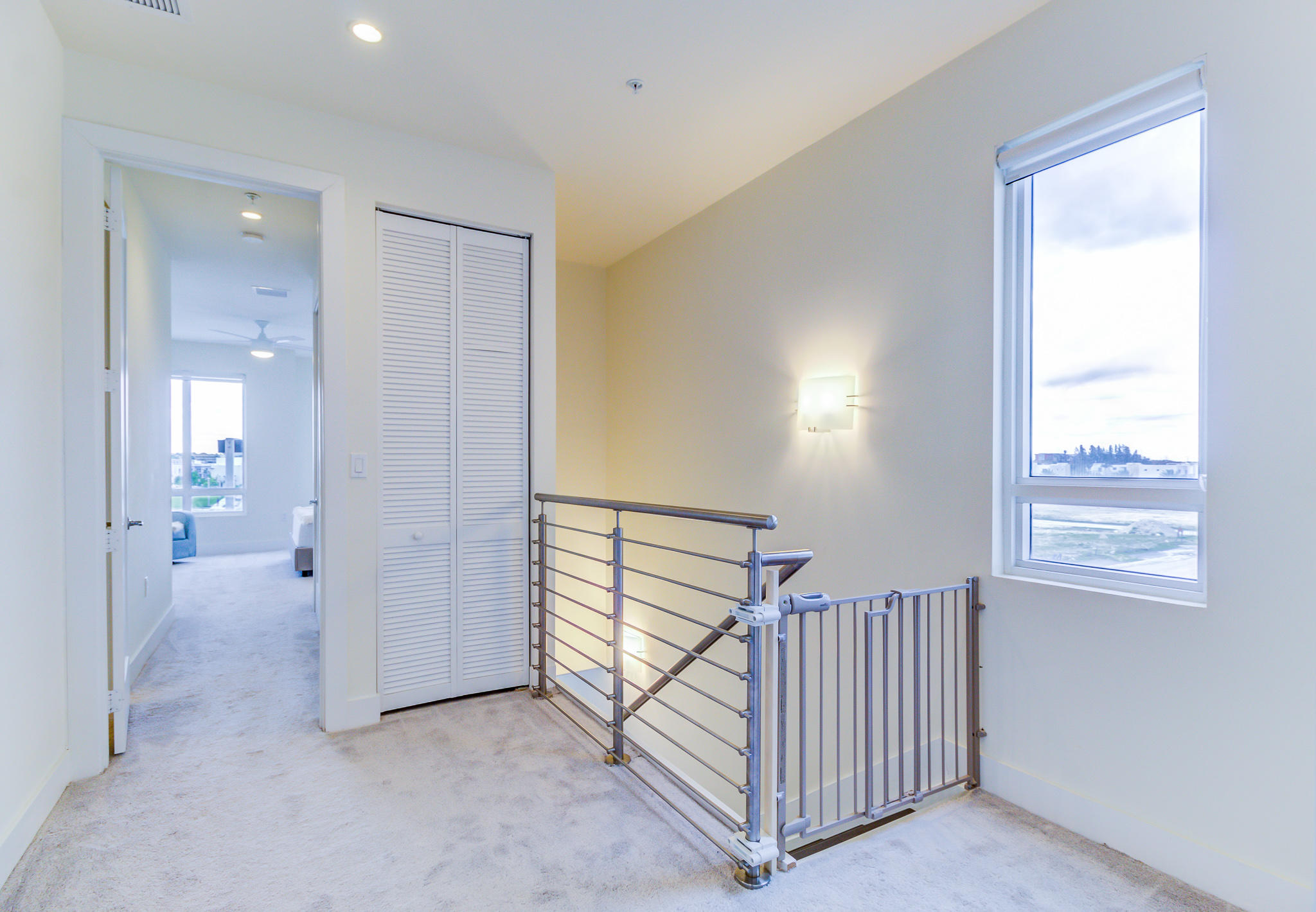 6415 Northwest 102nd Path, Unit 201 Doral, FL 33178 - Photo 9 of 41 an empty room with windows