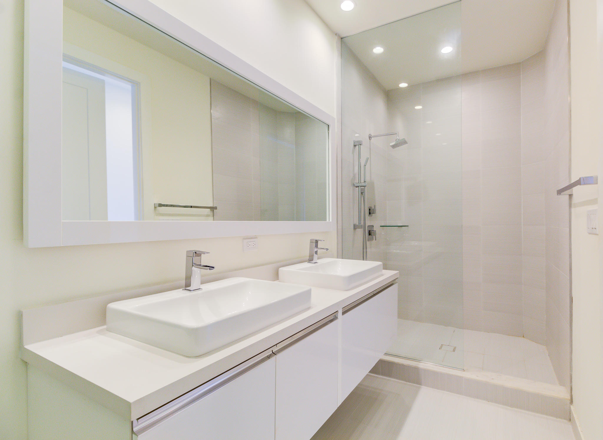 6415 Northwest 102nd Path, Unit 201 Doral, FL 33178 - Photo 10 of 41 a bathroom with a sink and a mirror