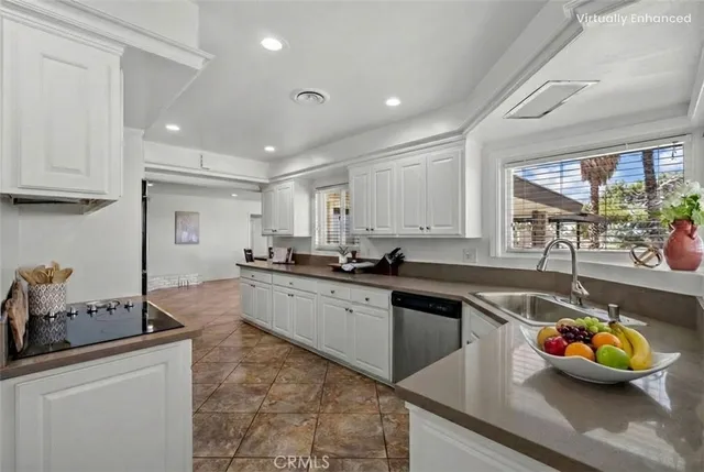 a kitchen with sink and window