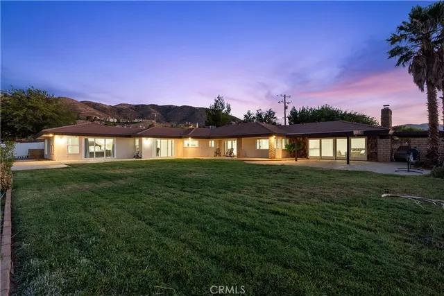 a view of a lake with a big yard