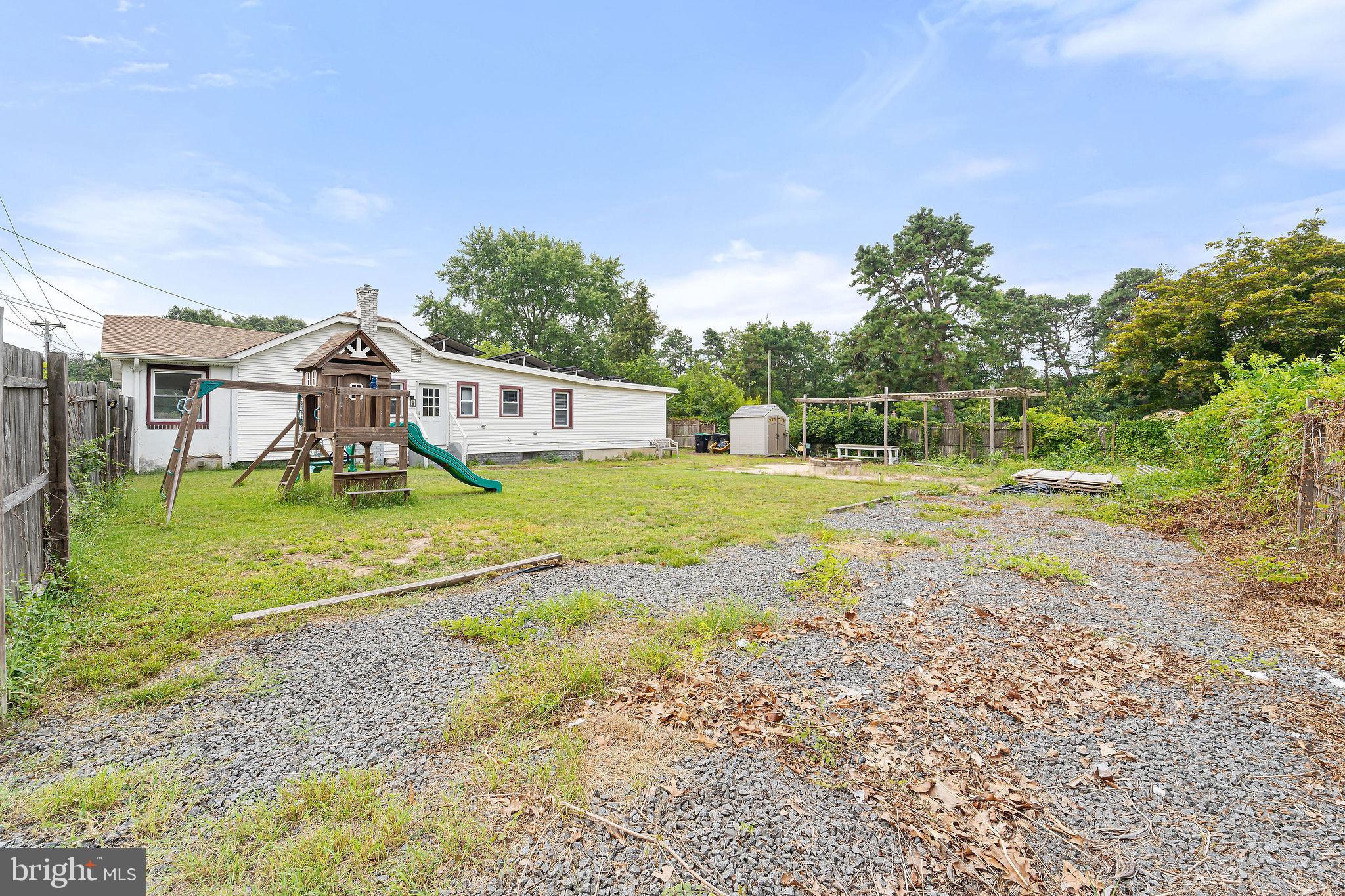 5 Sicklerville Road Sicklerville, NJ 08081 - Photo 20 of 25 a view of a house with a yard and sitting area