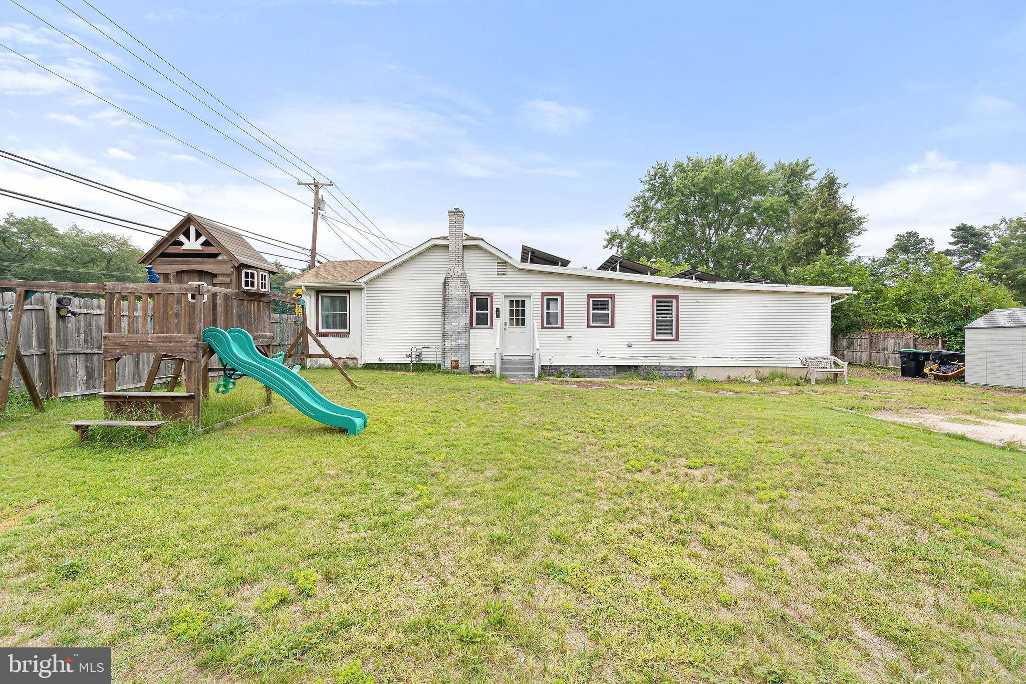 5 Sicklerville Road Sicklerville, NJ 08081 - Photo 22 of 25 a view of a house with a backyard and a small pool