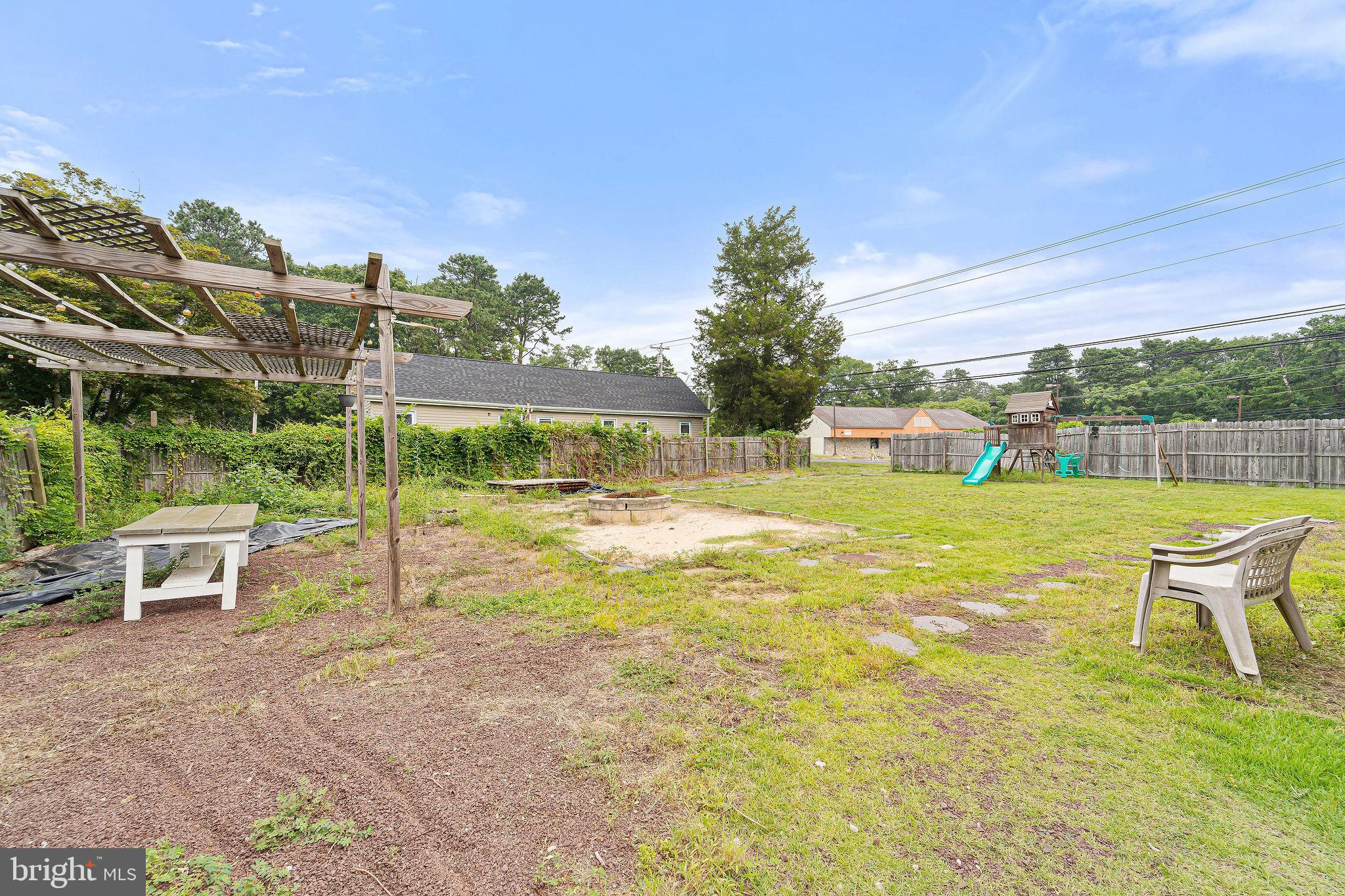 5 Sicklerville Road Sicklerville, NJ 08081 - Photo 23 of 25 a view of a swimming pool with a lounge chairs