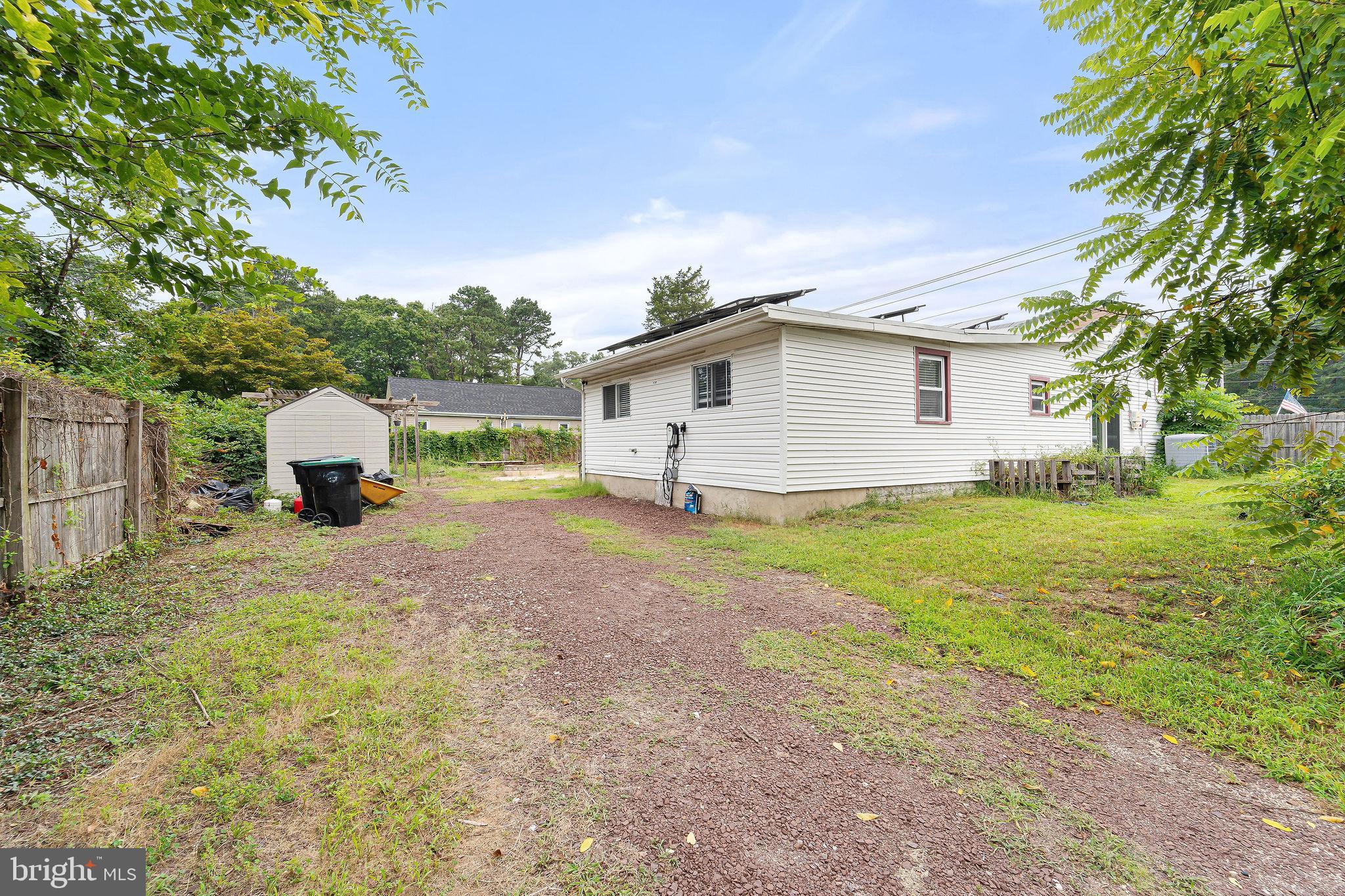 5 Sicklerville Road Sicklerville, NJ 08081 - Photo 24 of 25 a white house that has a tree in front of it