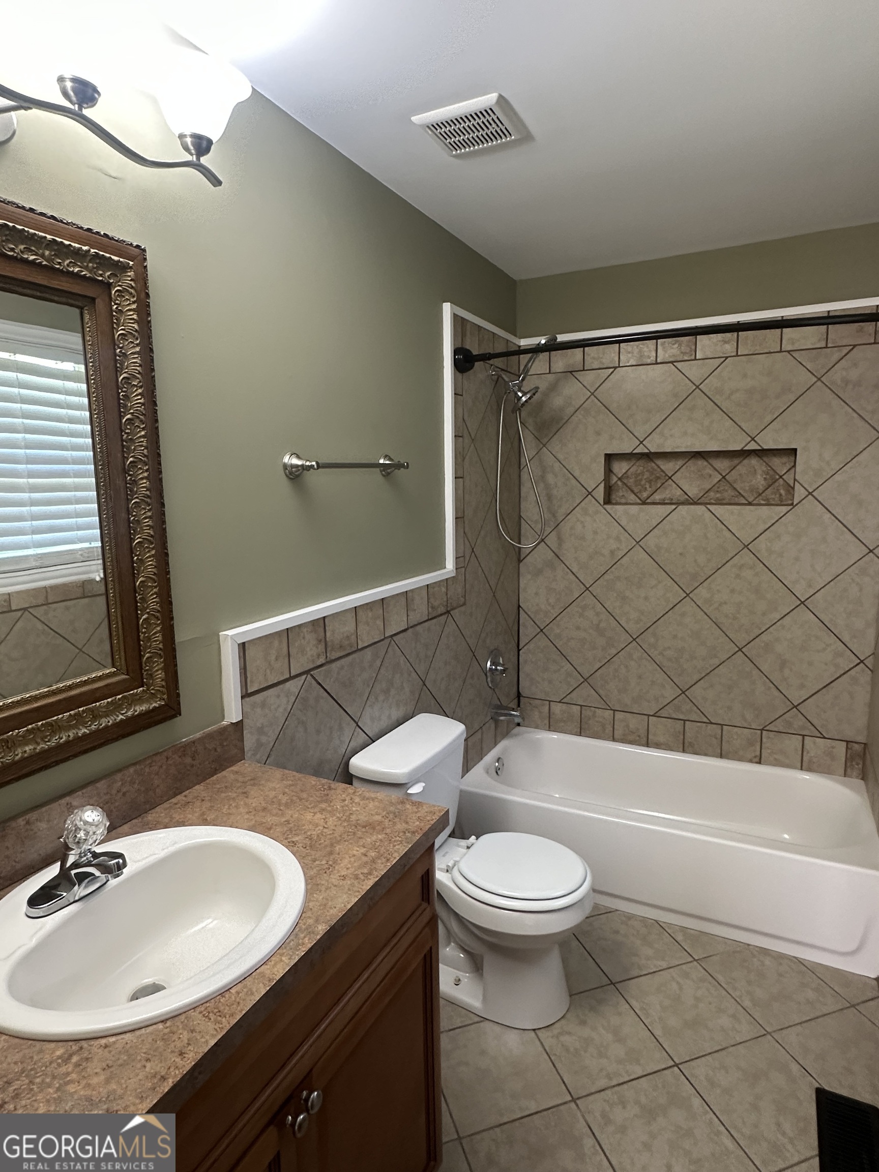 26 Isabelle's Way Colbert, GA 30628 - Photo 19 of 25 a bathroom with a sink a toilet and a bathtub
