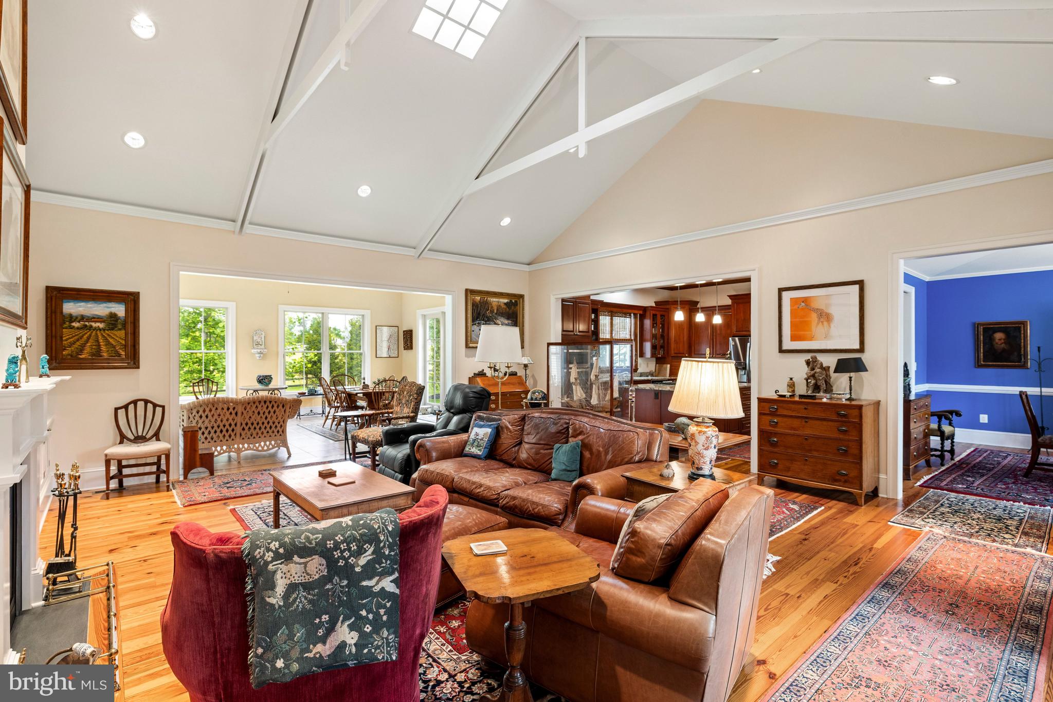 20147 Woodtrail Road Round Hill, VA 20141 - Photo 8 of 41 a living room with furniture kitchen view and a large window