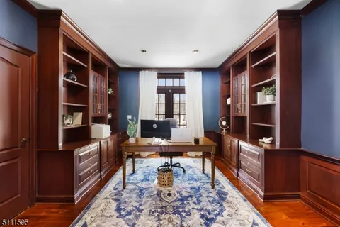 a bedroom with a large bed and a walk in closet