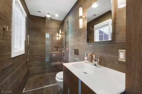 a bed room with a bed and a window