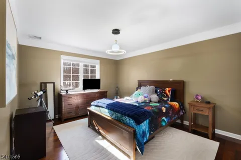 a view of a living room and kitchen in a back yard