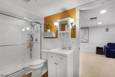 a kitchen with sink cabinets and appliances