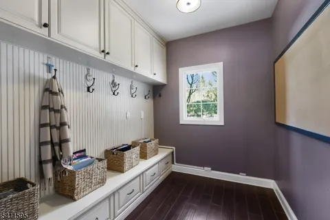 a view of a house with backyard porch and sitting area