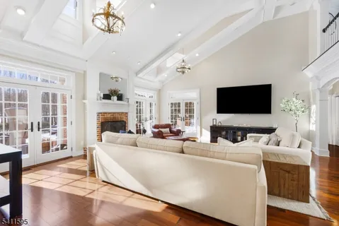 a living room with furniture or outdoor view and a fireplace