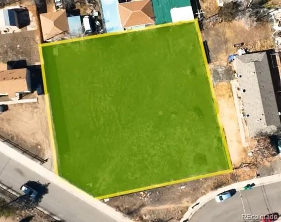 a view of a field with grass