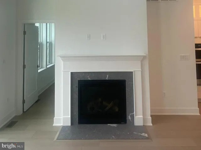 a living room with a fireplace